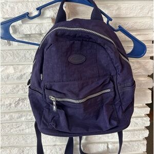 Lily & Drew mini purple back pack. Like new